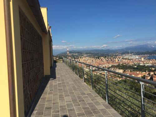 a balcony with a view of a city at Agriturismo La Pietra 1 e La Pietra 2 in La Spezia