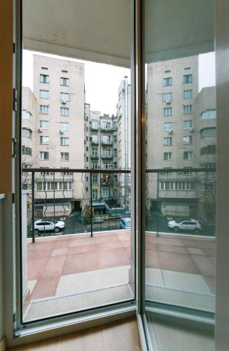 a window with a view of a city street at Apartments on Independence Square in Kyiv