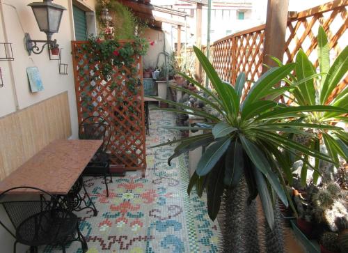 A balcony or terrace at Abitazione Pigneto B&B