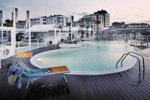 a swimming pool on the deck of a cruise ship at Hotel B&B Euro in Cattolica