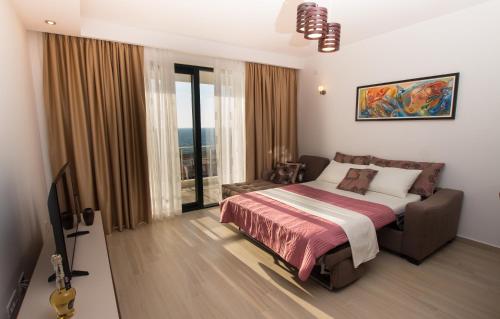 Postel nebo postele na pokoji v ubytování Apartment Ema Star