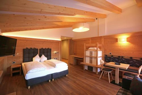 Posteľ alebo postele v izbe v ubytovaní Hotel Astoria