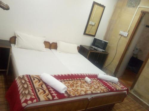 Postel nebo postele na pokoji v ubytování Hotel Desert