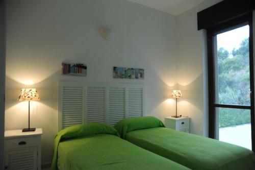 Una cama o camas en una habitación de Blu OltreMare