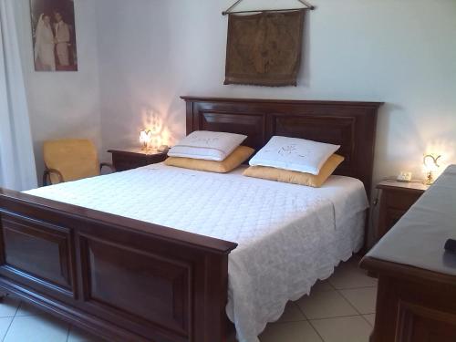 A bed or beds in a room at A Casa di Lavinia