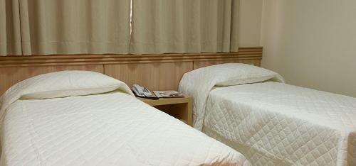 Katil atau katil-katil dalam bilik di Hotel Portal