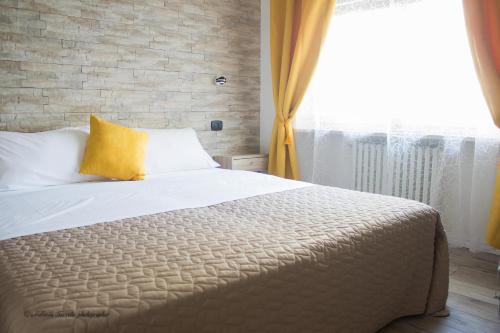 Cama o camas de una habitación en Aurelia Rooms