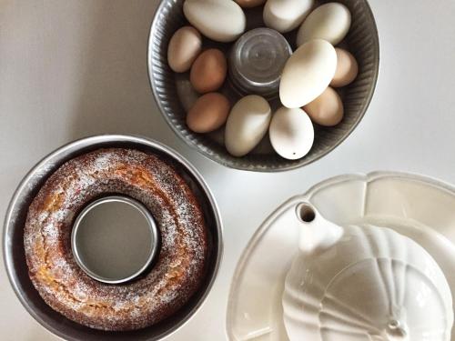 a table with eggs and a cup of coffee and a donut at Villa Pacchioni in Cavezzo