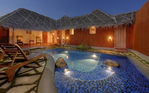 Piscina a Evolve Back Kabini o a prop