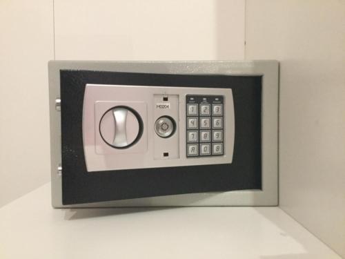 a microwave oven with its door open on a wall at Elite 19 in La Spezia