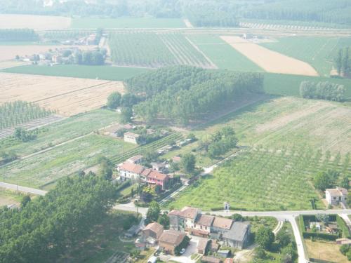 an aerial view of a house in a field at La Luce della Luna in Castelnovo Bariano