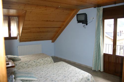 TV a/nebo společenská místnost v ubytování Casa Raspa