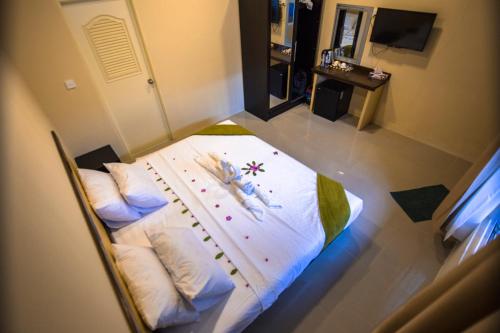 Cama o camas de una habitación en Ari heaven Thoddoo Maldives