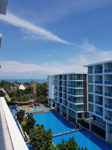 a view of the pool from the balcony of a building at My Resort Condo Hua Hin By Hua Hin Hip in Hua Hin