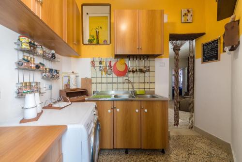 Kuchyň nebo kuchyňský kout v ubytování Casa sul Corso