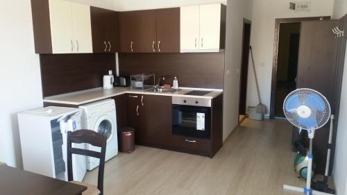 Kuchyň nebo kuchyňský kout v ubytování Villa Victory Apartments