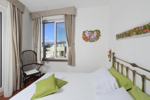 Un ou plusieurs lits dans un hébergement de l'établissement Badia Vecchia Apartment