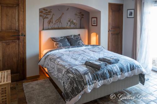 Postel nebo postele na pokoji v ubytování B&B L'Estuve provencale