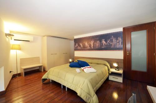 Een bed of bedden in een kamer bij Italia Apartment