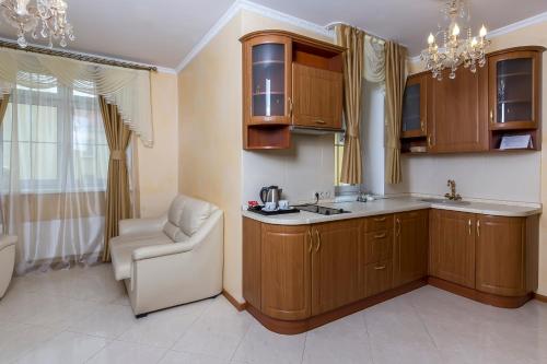 A kitchen or kitchenette at Princess Elisa Hotel