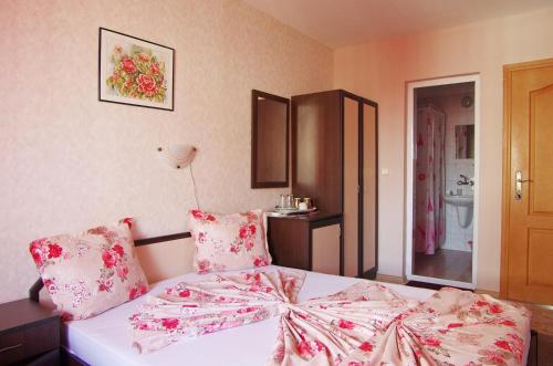 Postel nebo postele na pokoji v ubytování Violeta 7 Guest House