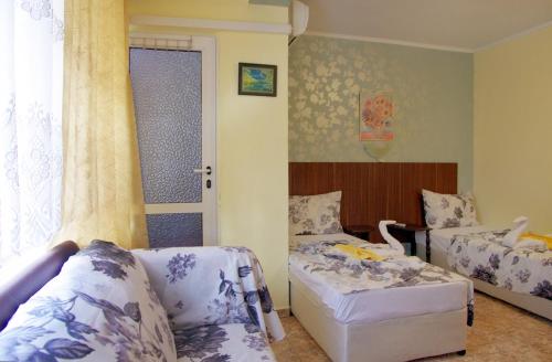 Posezení v ubytování Violeta 7 Guest House