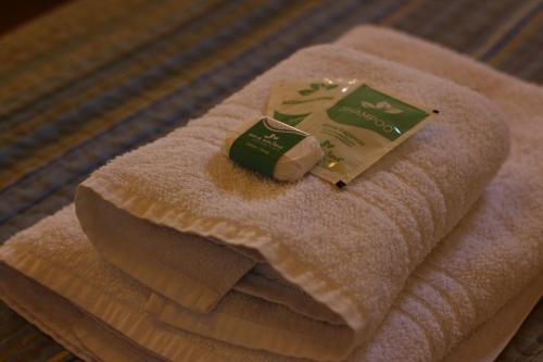 a stack of towels with a piece of butter on them at Casa Andina Chaltén in El Chalten