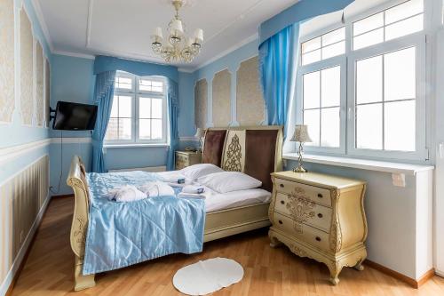Un pat sau paturi într-o cameră la Princess Elisa Hotel
