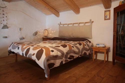 Säng eller sängar i ett rum på Casa Acquarossa