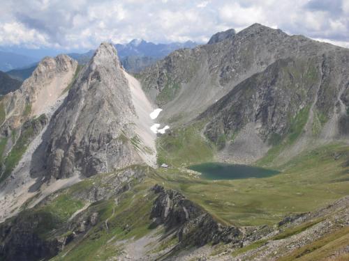 a mountain with a lake in the middle of it at Troadkasten in Kötschach