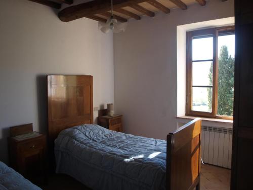 A bed or beds in a room at Santa Margherita