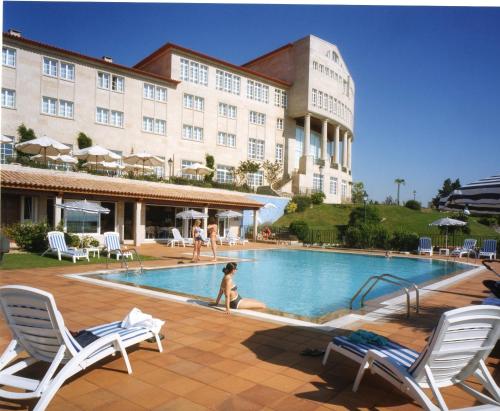 Piscina de la sau aproape de Gran Hotel Los Abetos