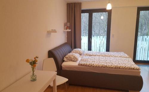 Postel nebo postele na pokoji v ubytování Apartment David Garden Towers