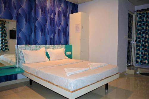 Cama o camas de una habitación en Hotel BluRay
