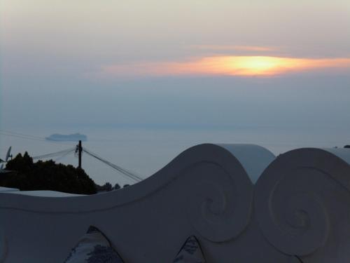 a view of the sun setting behind a skate park at B&B Villa Cristina in Anacapri