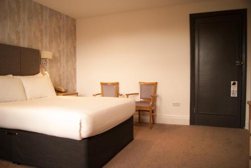 Ocean Beach Hotel & Spa - OCEANA COLLECTIONにあるベッド