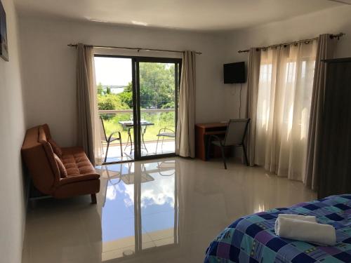 Postel nebo postele na pokoji v ubytování Luxe Exotica Apartments
