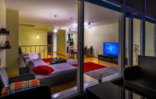 Ένα ή περισσότερα κρεβάτια σε δωμάτιο στο AirHome Apartments