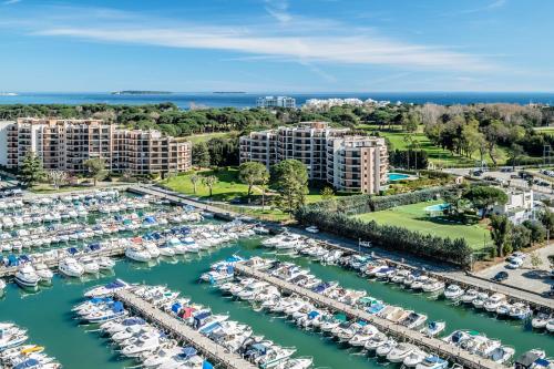 an aerial view of a marina with boats at Cannes Marina Appart Hotel Mandelieu in Mandelieu-la-Napoule