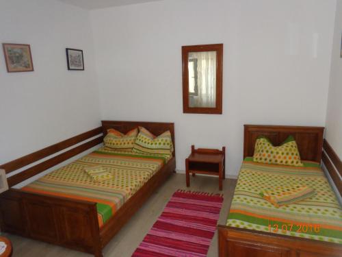 Cama o camas de una habitación en Casa Munteanu