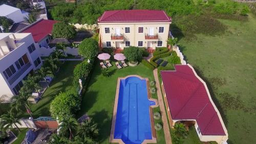 an aerial view of a house with a swimming pool at Star View Boutique Resort in Dumaguete