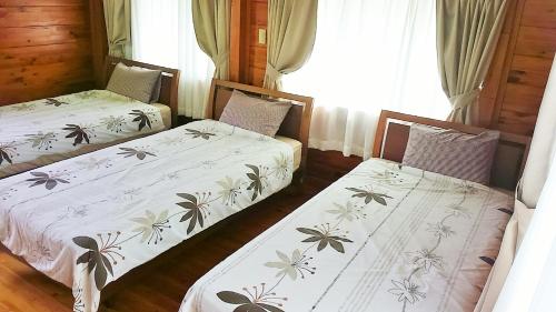 Katil atau katil-katil dalam bilik di Cottage Morino Paradiso