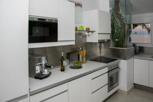 Dapur atau dapur kecil di Villa Evita