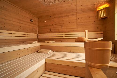 a wooden sauna with two beds in it at Gasthof Gigl in Neustadt an der Donau