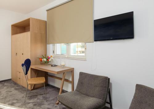 TV a/nebo společenská místnost v ubytování Boban Luxury Suites