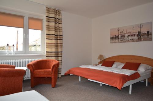 Postel nebo postele na pokoji v ubytování Apartman JaS