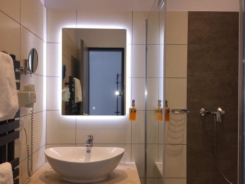 Koupelna v ubytování Median Hotel Garni