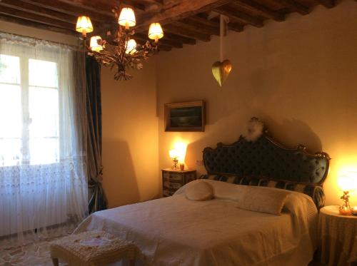 Posteľ alebo postele v izbe v ubytovaní La casa del cuore