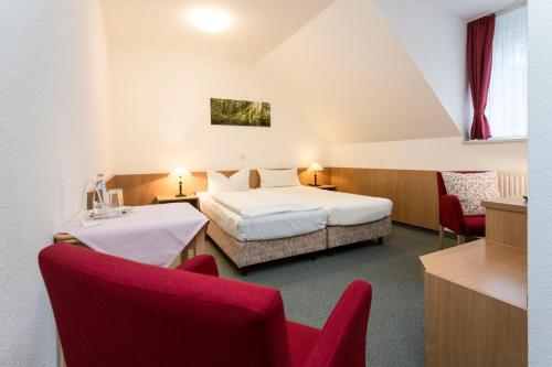 מיטה או מיטות בחדר ב-Pension & Restaurant Nordstern
