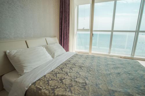 Katil atau katil-katil dalam bilik di Haeundae Bada Condo